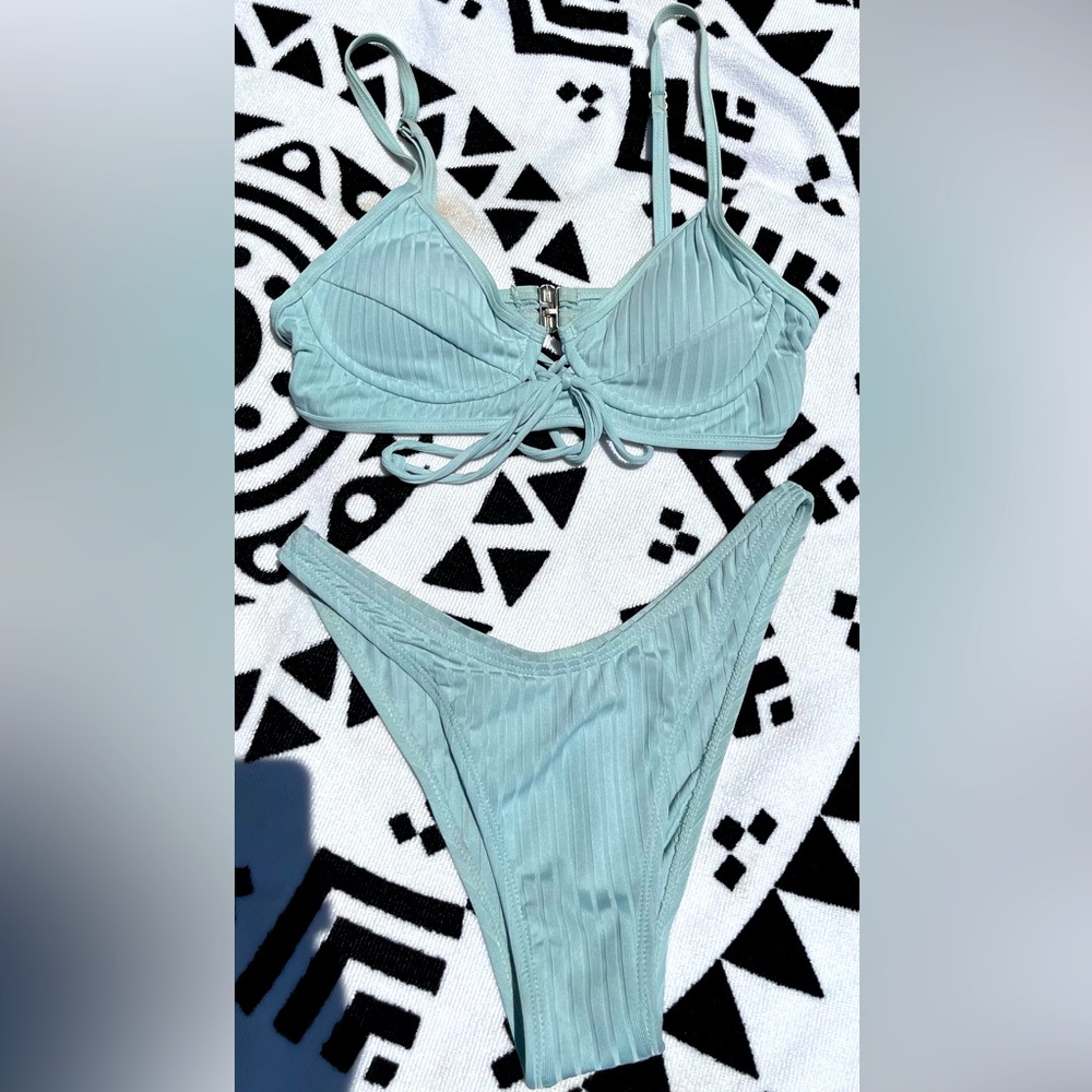 Small, two piece bikini, adjustable straps, high rise bottoms :)